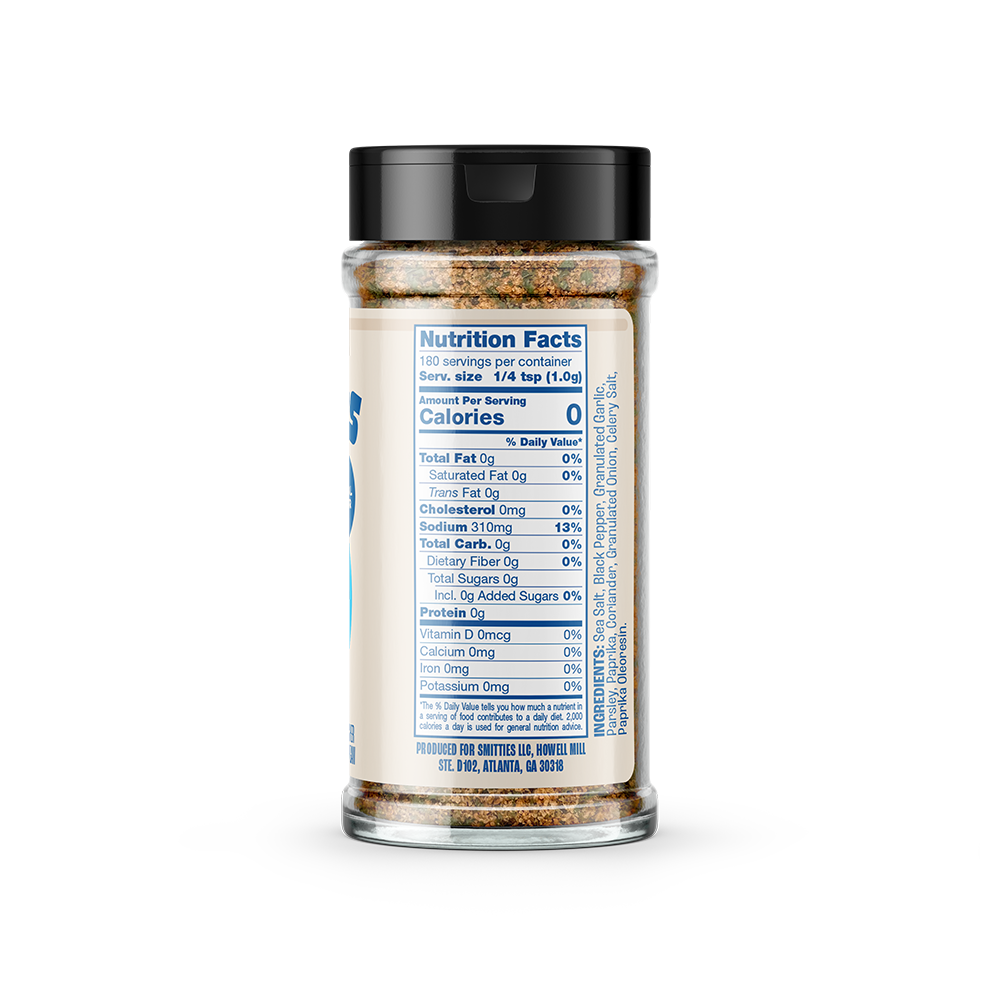 Back of the shaker of Smitties Everyday Seasoning, containing the nutrition panel:
Serving size: ¼ tsp (1.0g).
180 servings per container.
Sodium, 310mg, 10% daily value.
All other nutrients 0% daily value.
Ingredients: Sea Salt, Black Pepper, Granulated Garlic, Parsley, Paprika, Coriander, Granulated Onion, Celery Salt, Paprika Oleoresin.
Produced for Smitties LLC, Howell Will, Ste.D 102, Atlanta, GA, 30318.